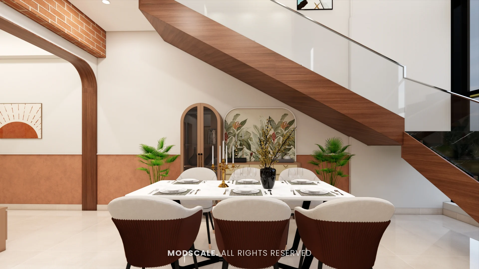 Dining table with blush chairs under the wooden staircase, Amrita Gupta’s home interior on Sarjapur Road