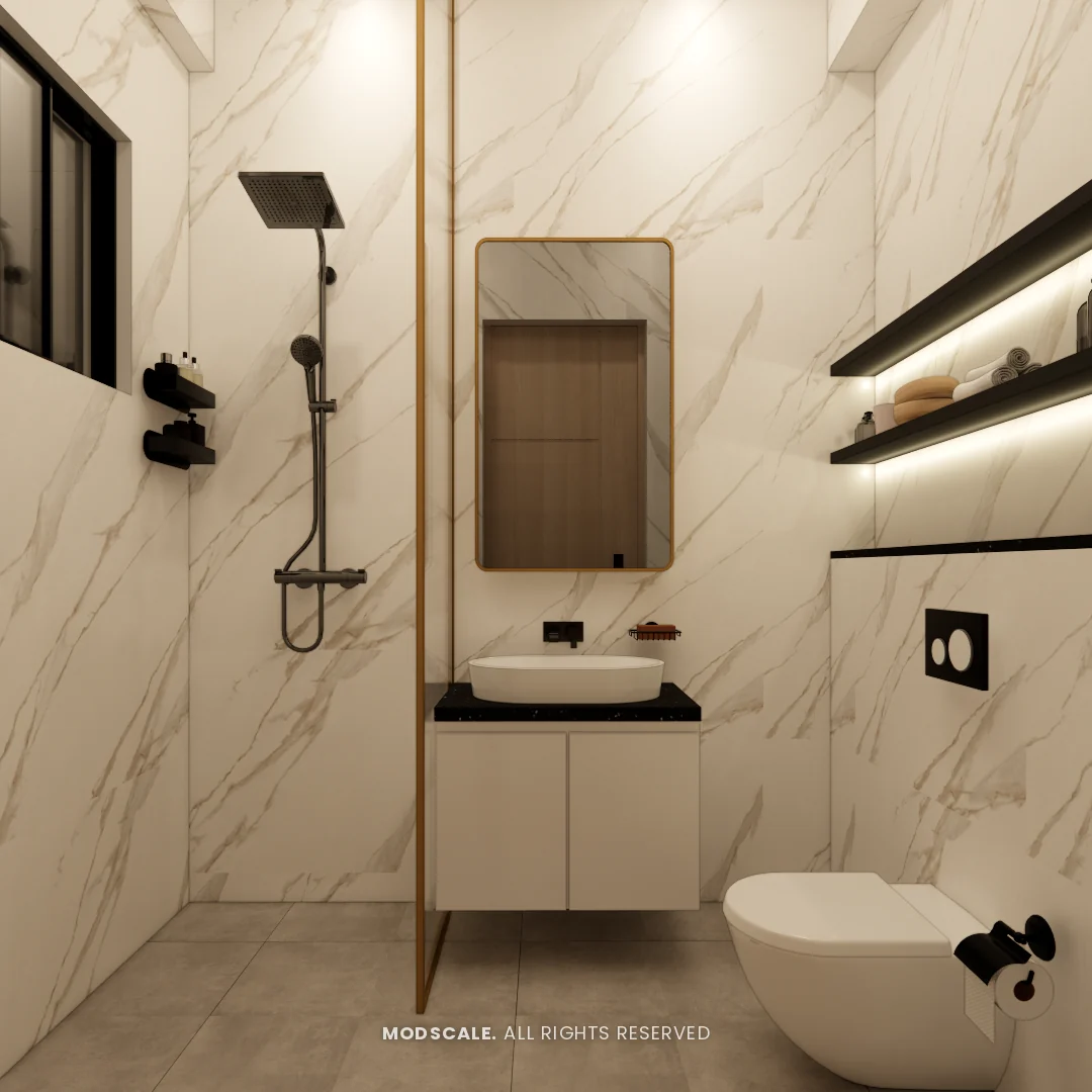 Bathroom with marble-look tiles, gold-framed glass screen and lit shelf niche, Annu’s villa interior at Purva Woodfield, Chandapura, Bengaluru