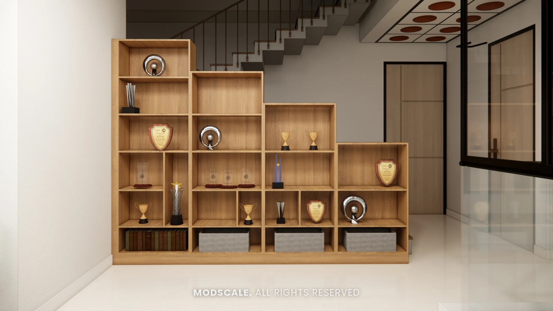 Stepped wooden display unit for awards under the staircase, Annu’s villa interior at Purva Woodfield, Chandapura, Bengaluru