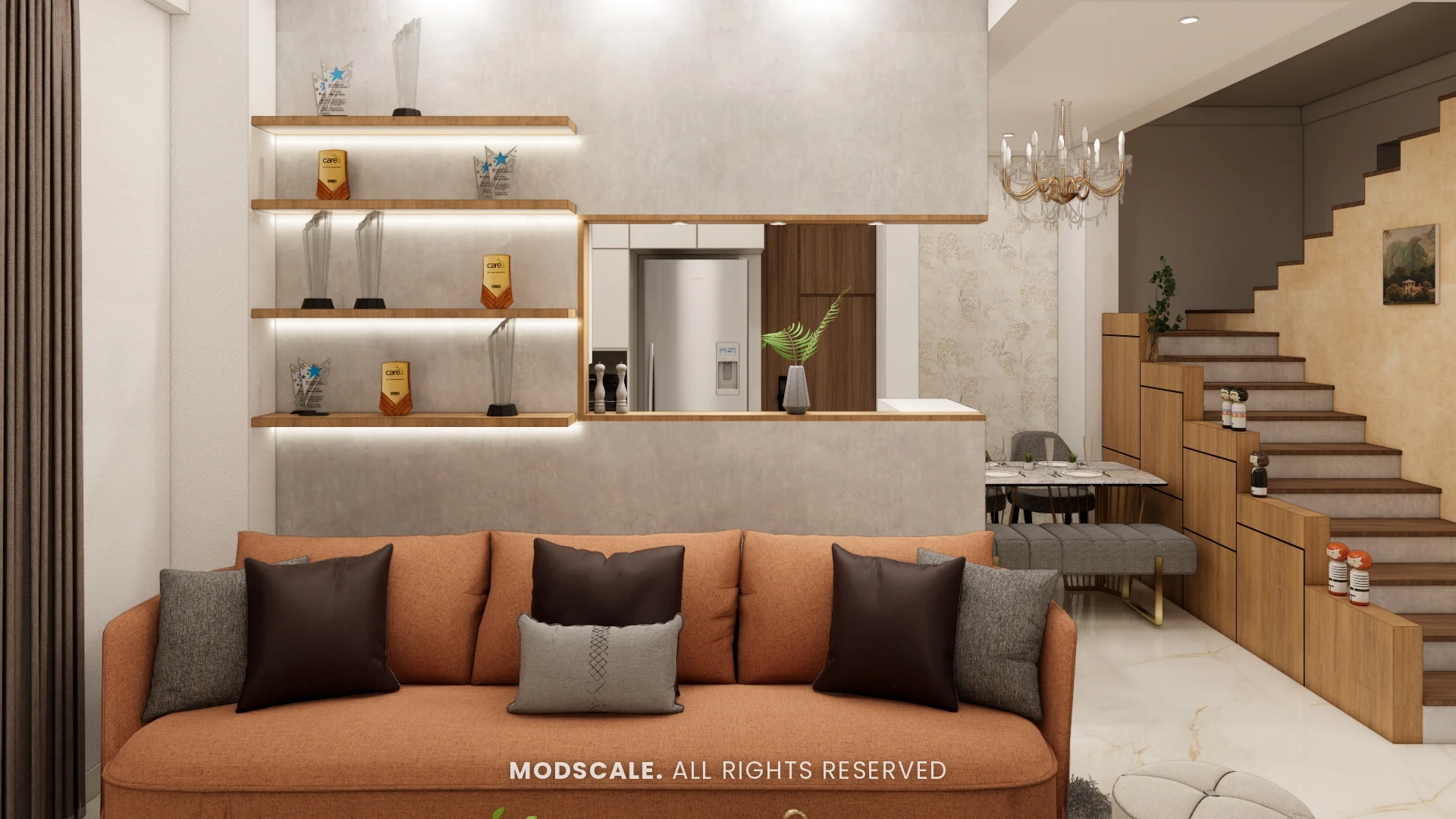 Terracotta sofa below lit display shelves, with kitchen pass-through and dining beyond, Annu’s villa interior at Purva Woodfield, Chandapura, Bengaluru