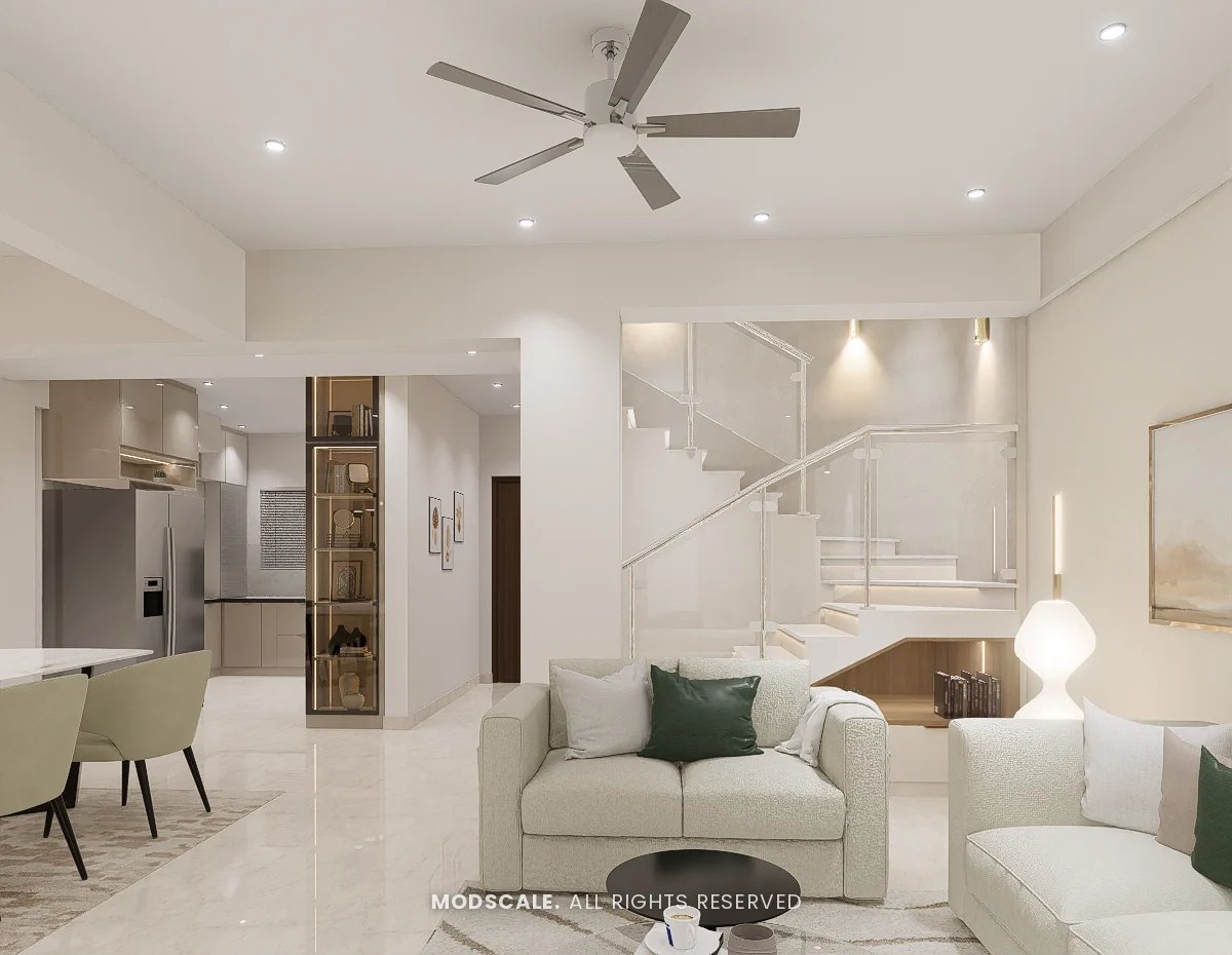 Living room open to the dining area and kitchen, with glass-railed staircase behind, Praveen’s villa interior at Springville, Harlur, Bengaluru
