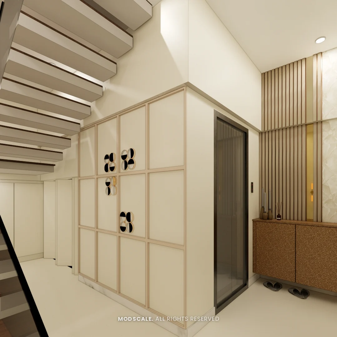 Panelled storage wall under the staircase beside the lift, Shikha Agarwal’s villa interior at Purva Woodfield, Chandapura, Bengaluru