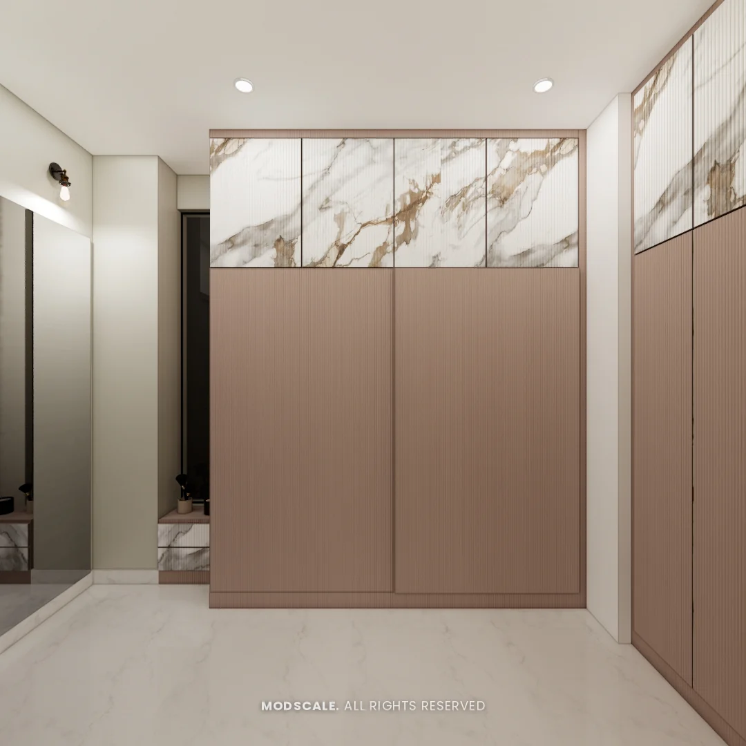 Walk-in wardrobe in dusty rose with marble-finish lofts, Shikha Agarwal’s villa interior at Purva Woodfield, Chandapura, Bengaluru