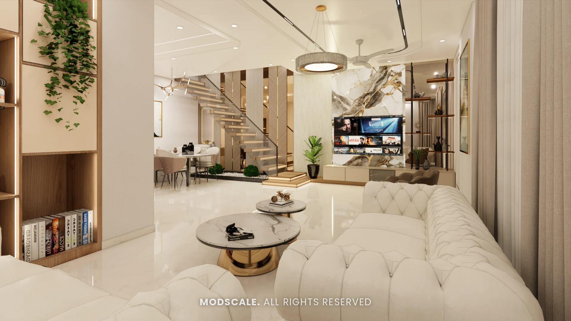 Living room with cream tufted sofas, marble TV wall and staircase beyond, Shruthi’s villa interior in Hassan