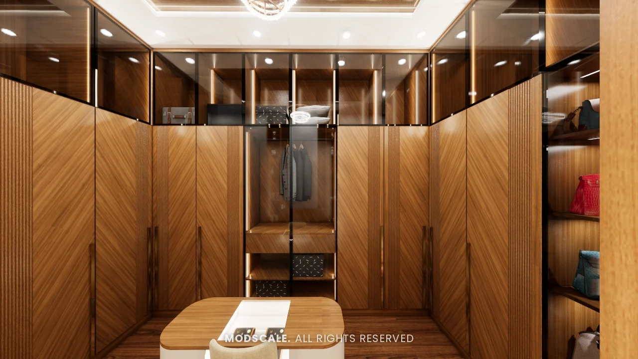 Walk-in wardrobe in walnut finish with island and glass-front shelves, Sidhartha Shankar house interior, Kanakapura Road