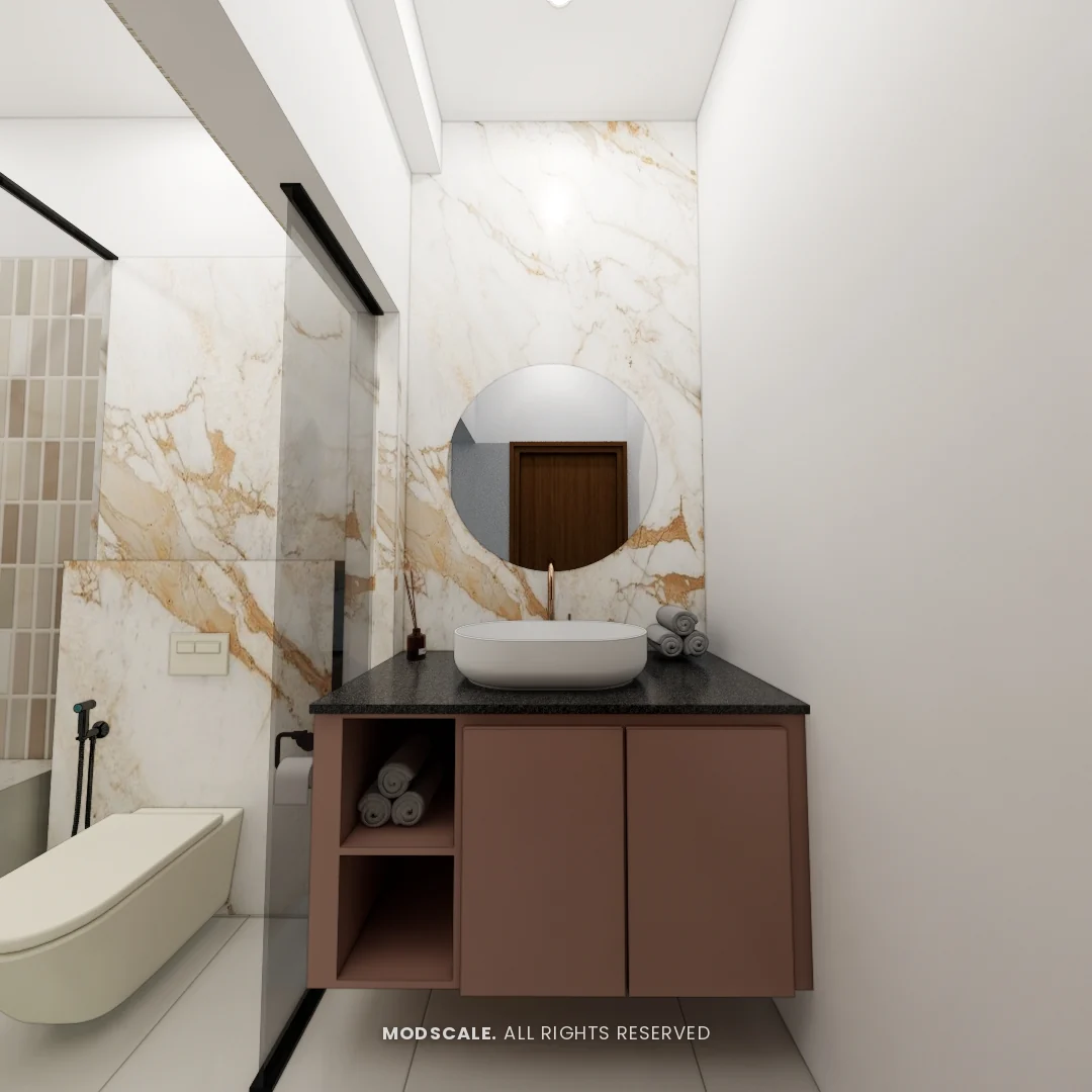 Master bathroom vanity with round mirror and marble-finish wall, Sumana’s home interior in Banashankari